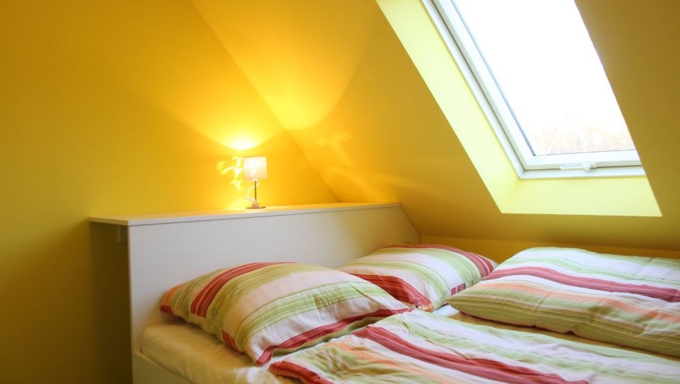 Schlafzimmer im Haus Ole // © MITourA GmbH Schlafzimmer im Haus Ole // © MITourA GmbH