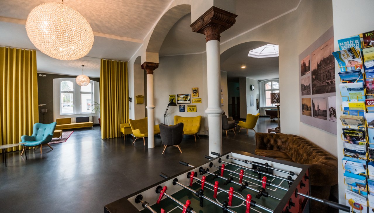 Gemeenschappelijke lobby met tafelvoetbal en zitjes, &copy; Robert Vorwieger (Postel Usedom GMbH)
