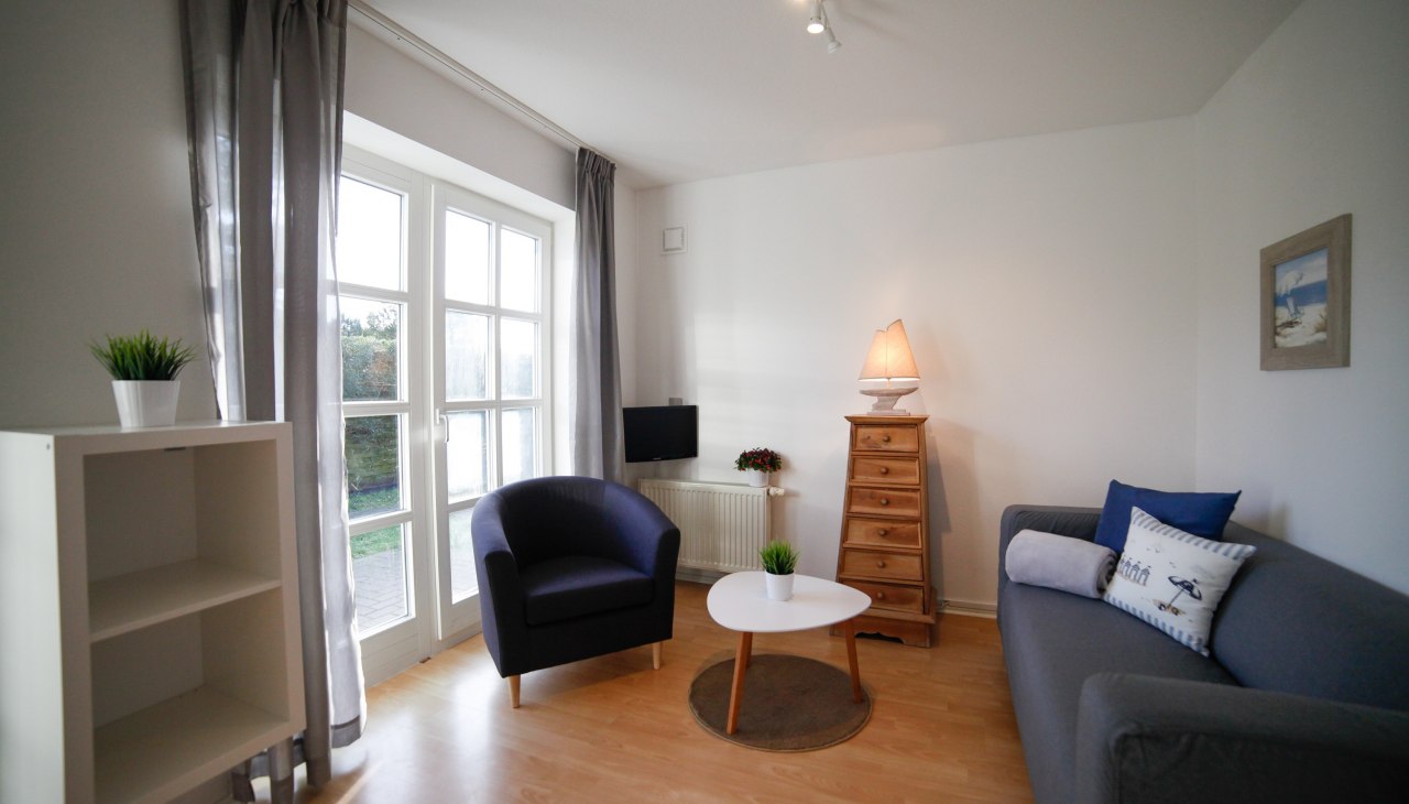 Captain Pahlen Ferienanlage - Terrassen-Appartement Wohnbereich, © Captain Pahlen Ferienanlage