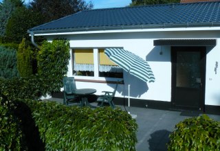 Aussenansicht mit Terasse // &copy; J&ouml;rg Kr&uuml;ger