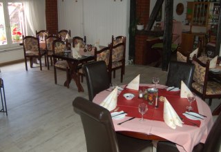 Entspannte Stunden im Gastraum des Gasthofs "Zum F&auml;&szlig;chen", &copy; Gasthof & Pension "Zum F&auml;&szlig;chen" / Wilken