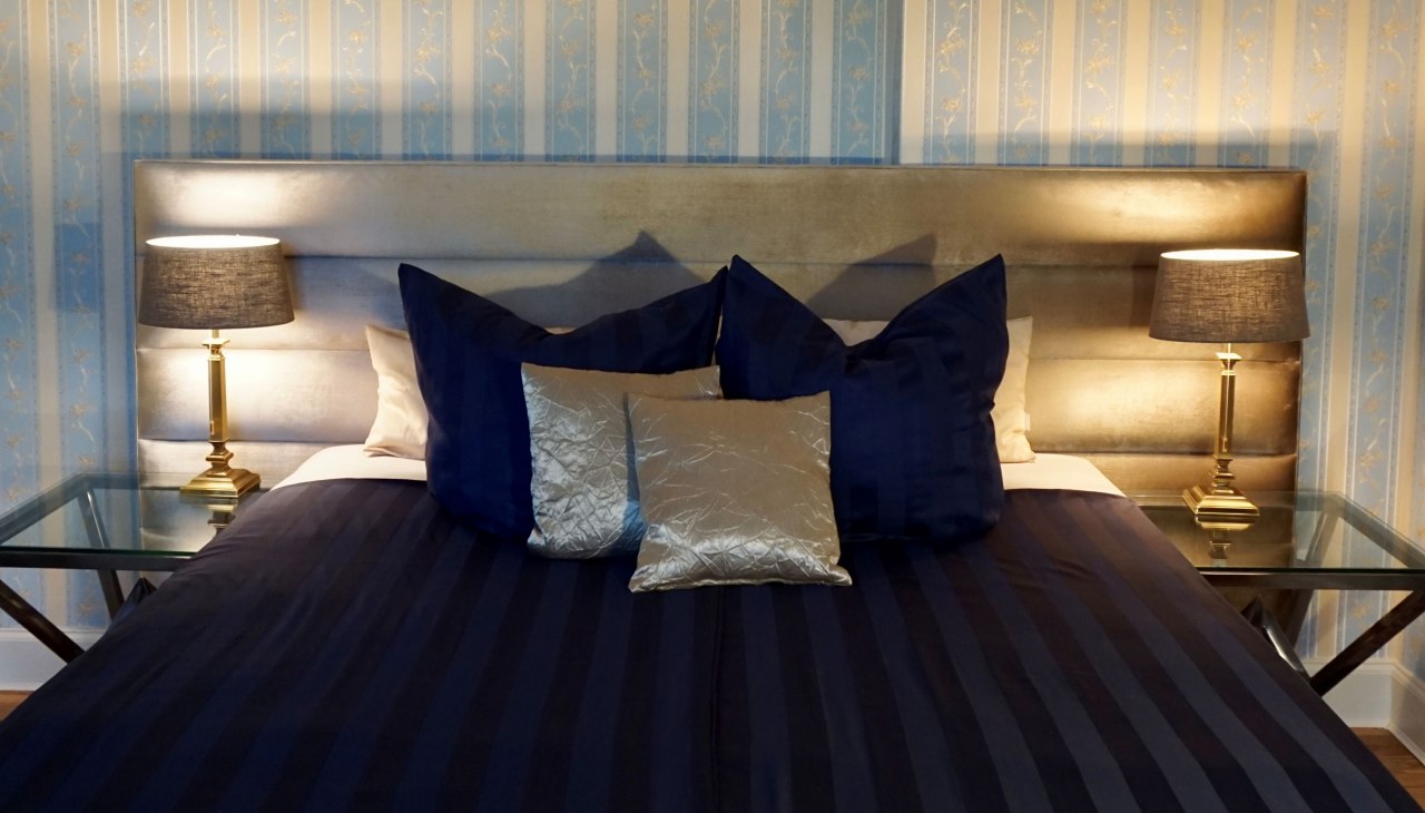 Slaapkamer in het landhuis Gevezin, © Gutshaus Gevezin Slaapkamer in het landhuis Gevezin, © Gutshaus Gevezin