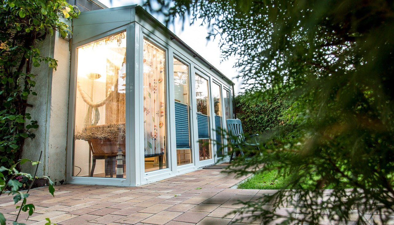 Eingangsbereich mit Wintergarten, © Fotografie Sebastian John Eingangsbereich mit Wintergarten, © Fotografie Sebastian John