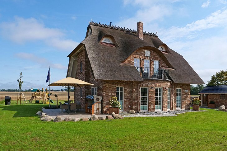 Haus "Landliebe unter Reet" in Poseritz auf Rügen, © P. Dombrowski Haus "Landliebe unter Reet" in Poseritz auf Rügen, © P. Dombrowski