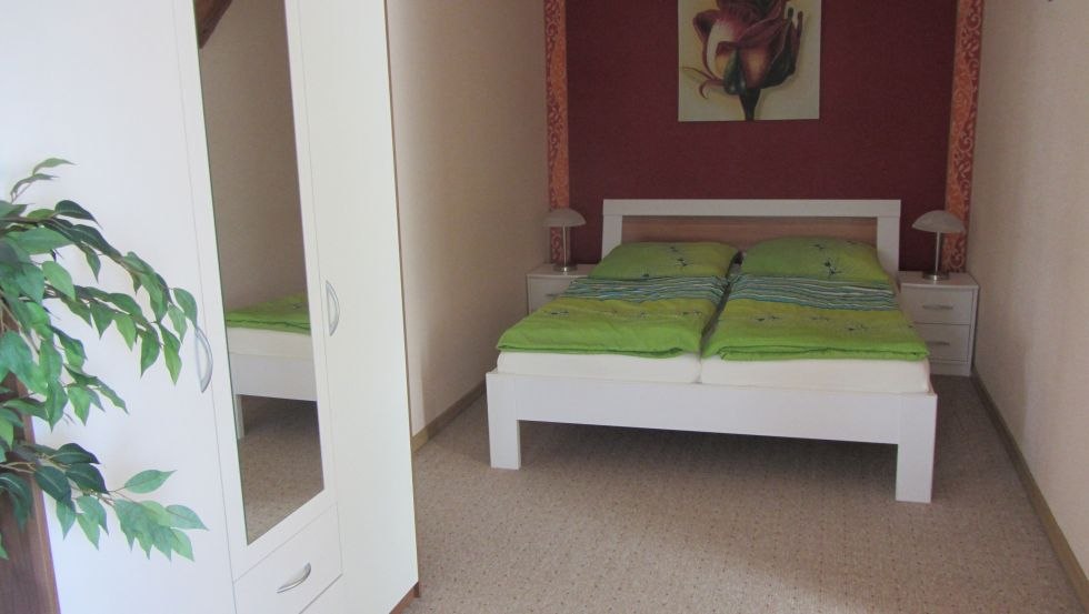 Schlafzimmer FeWo Haus Birgit // © Birgit Prüter Schlafzimmer FeWo Haus Birgit // © Birgit Prüter