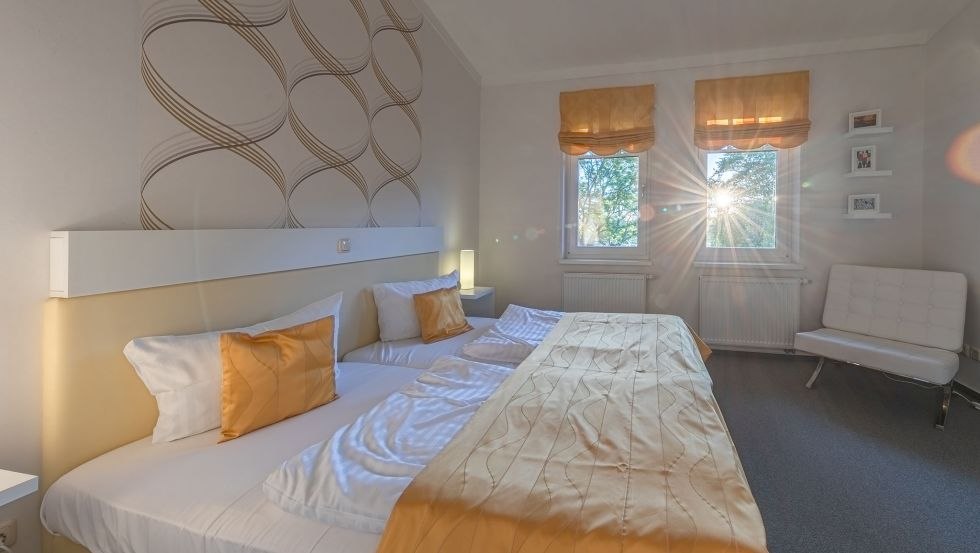 Schlafzimmer mit Doppelbett // © Andre Pretzel Schlafzimmer mit Doppelbett // © Andre Pretzel