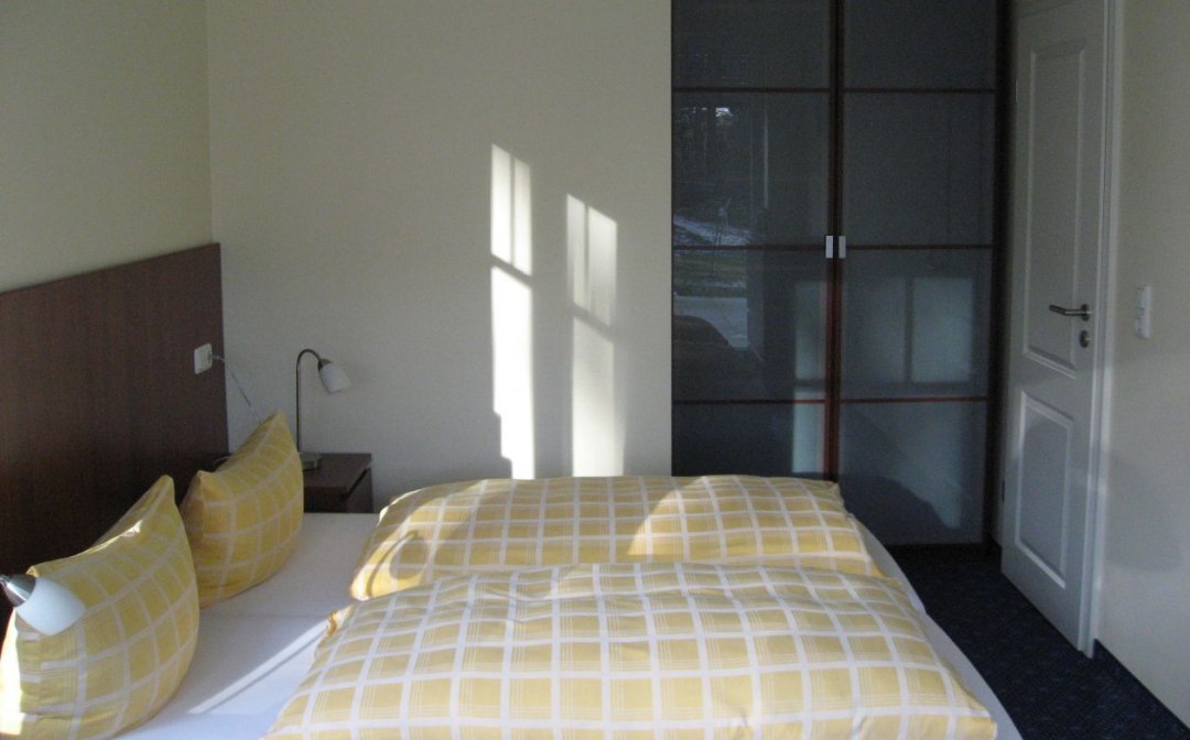 Schlafzimmer im Appartementhaus Ostseeresidenz, © Appartementhaus Ostseeresidenz Schlafzimmer im Appartementhaus Ostseeresidenz, © Appartementhaus Ostseeresidenz