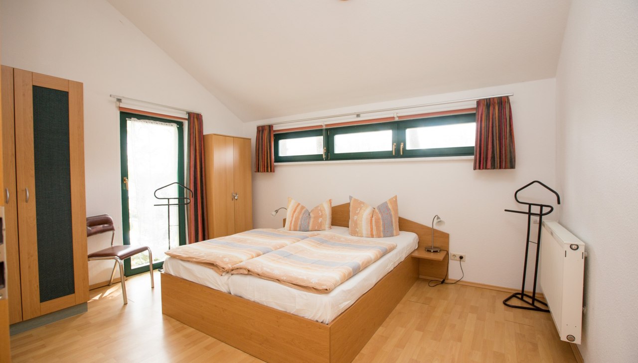 Schlafzimmer im Ferienhaus Waldschneise, © Ferienkontor Schlafzimmer im Ferienhaus Waldschneise, © Ferienkontor
