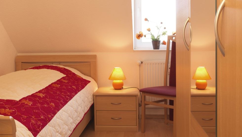 Schlafzimmer in der Fewo Meeresrauschen, © Poeler Appartement Service GmbH