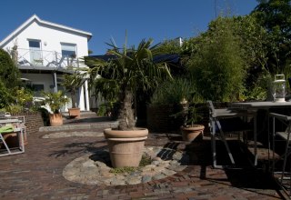 Der idyllische Garten lädt zum verweilen ein, © T. Eden Der idyllische Garten lädt zum verweilen ein, © T. Eden