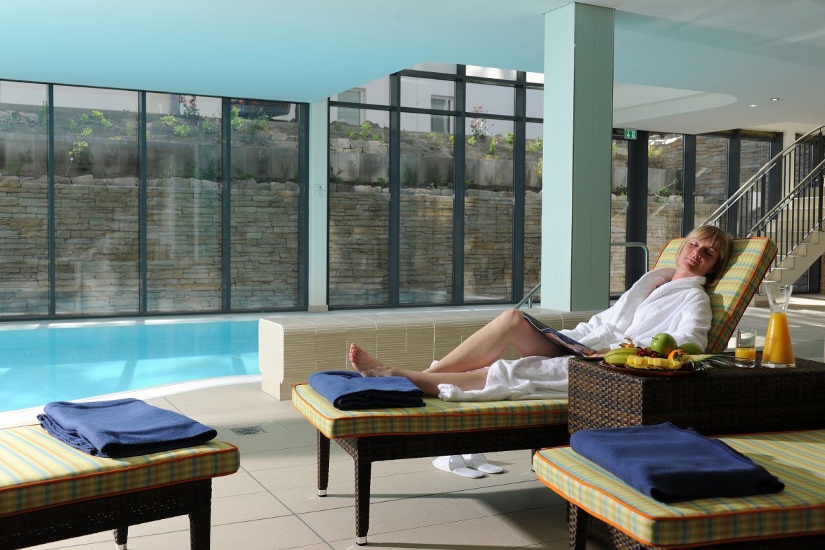 Wellnessbereich mit Schwimmbad // © Hotel Hübner GmbH Wellnessbereich mit Schwimmbad // © Hotel Hübner GmbH