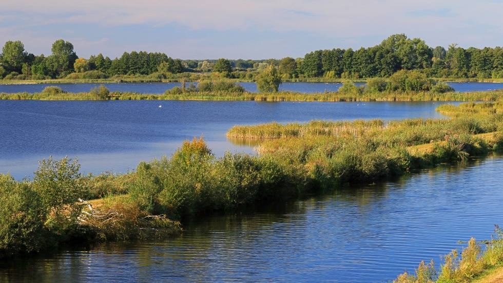 Visvijvers in het Lewitz natuurreservaat - uitzicht vanaf de Dütschow brug in noordelijke richting, © Lewitzfotograf.de-Ralf Ottmann Visvijvers in het Lewitz natuurreservaat - uitzicht vanaf de Dütschow brug in noordelijke richting, © Lewitzfotograf.de-Ralf Ottmann