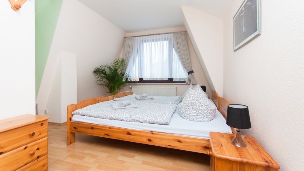 Schlafzimmerbeispiel der Ferienanlage, © Ferienanlage Dröse_P. Lipke